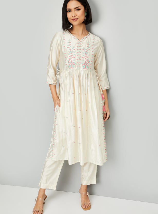 Women Embroidered Straight Kurta Set